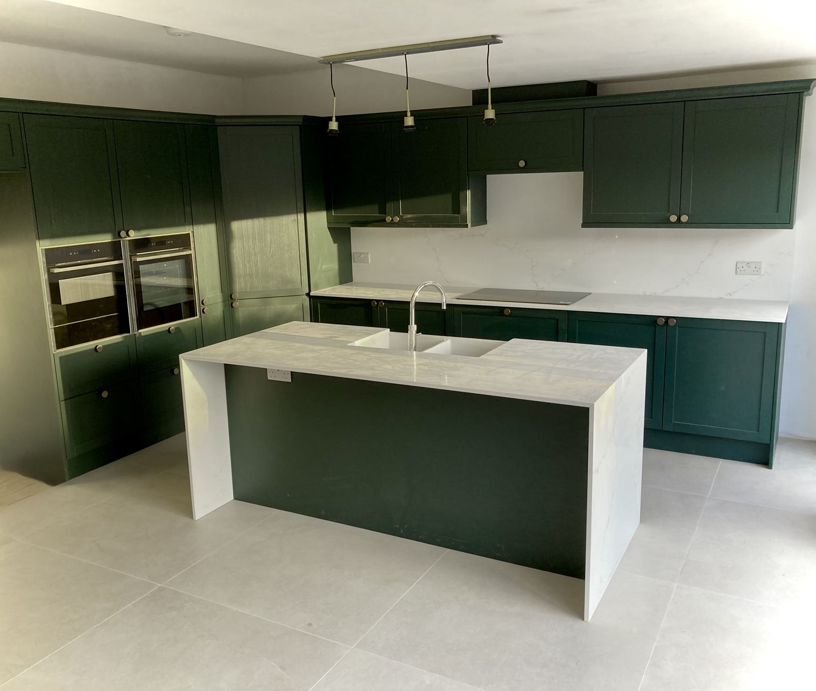 Hand-painted green shaker kitchen with quartz island, Cardiff