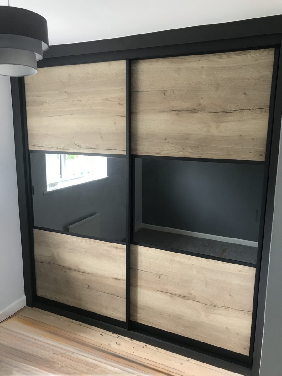 Black frame oak sliding wardrobe — Fitted Homes