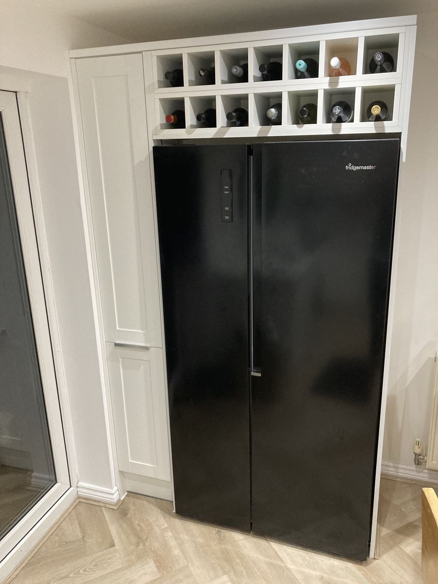 Fitted fridge surround with made-to-measure wine rack